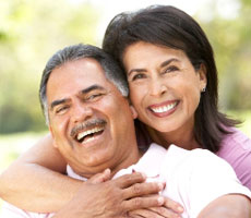 couple smiling after  receiving services from Solomon, Sullivan & Romo - Tallahassee disability lawyers